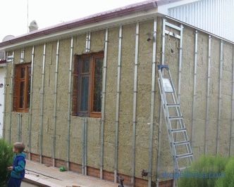 Comment recouvrir une maison en bois avec un revêtement isolant: instructions étape par étape